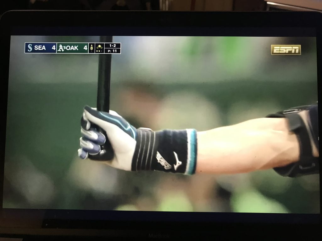 Ichiro holding baseball bat at his last at bat